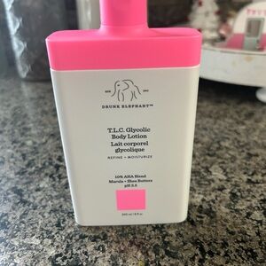 Drunk Elephant T.L.C. Glycolic Body Lotion with Bright Pink Accent